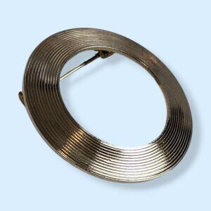 V. Metal Ring Cut Out Brooch